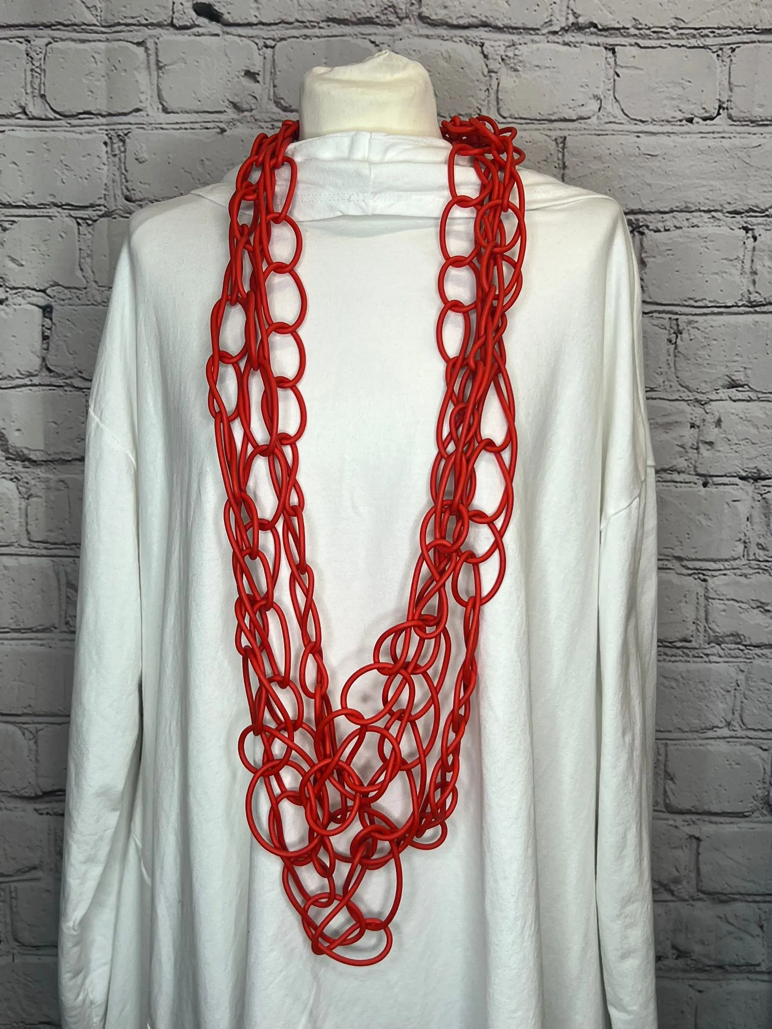 I. D. Long Rubber Triple Chain Necklace